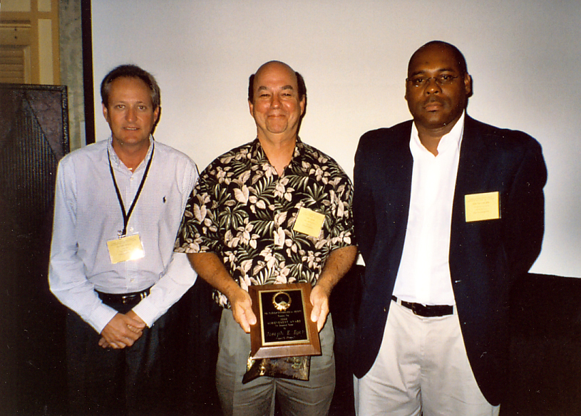 2008 Team Research award presented by Oscar Liburd to David Hall (left) and Joe Eger (center)