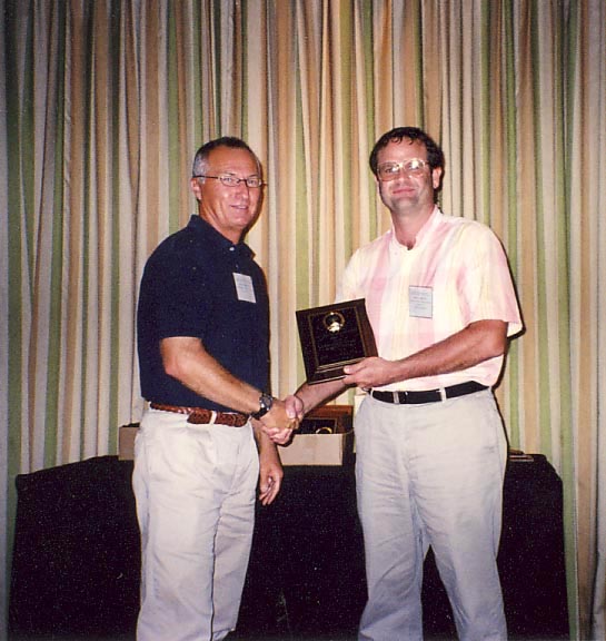 Paul Skelley receives 2009 Award for Regulatory Entomology from Scott Ferguson