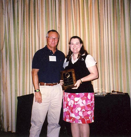 2009- Rebecca Baldwin receivesTeaching in Higher Education award from Scott Ferguson
