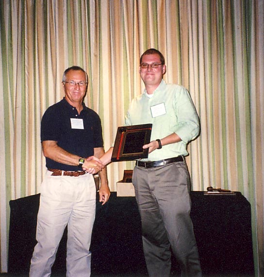 Lukasz Stelinski receives Entomologist of year award from Scott Ferguson