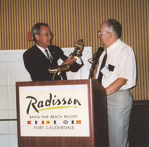 Charlie O'Brien receives Pioneer Lecture award from David Hall