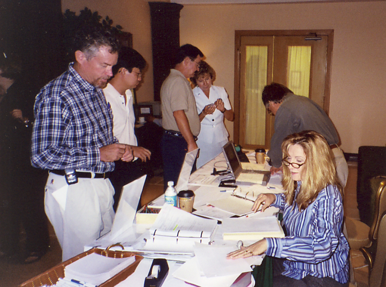 Teresa Duchene and entomologists at registration desk