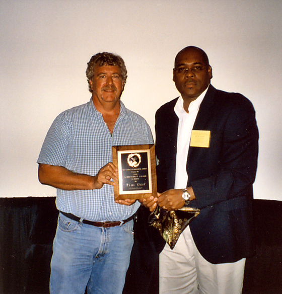 TimGast receiving 2008 Annual Achievement Award in Industry from Oscar Liburd