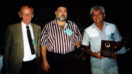 Ara Manukian and Rudy Strohschein, two of the three recipients of the Annual Achievement Award to Industry and Team Research (combined), with Howard Frank