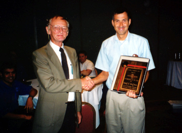 Rudi Scheffrahn wins the Entomologist of the Year Award from Howard Frank