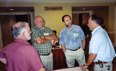 Gary Leibee, Clay McCoy, Russ Mizell, and Phil Stansly in a discussion